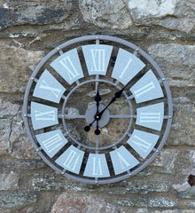 Grey Metal Skeleton Clock