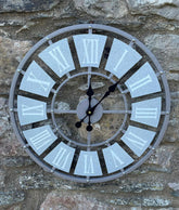 Grey Metal Skeleton Clock