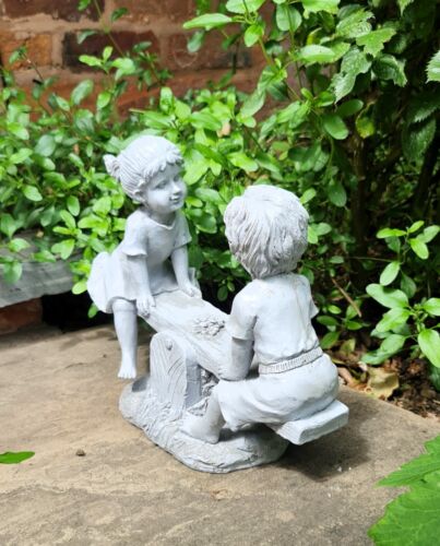 Garden Ornament Boy and Girl playing on a Seesaw