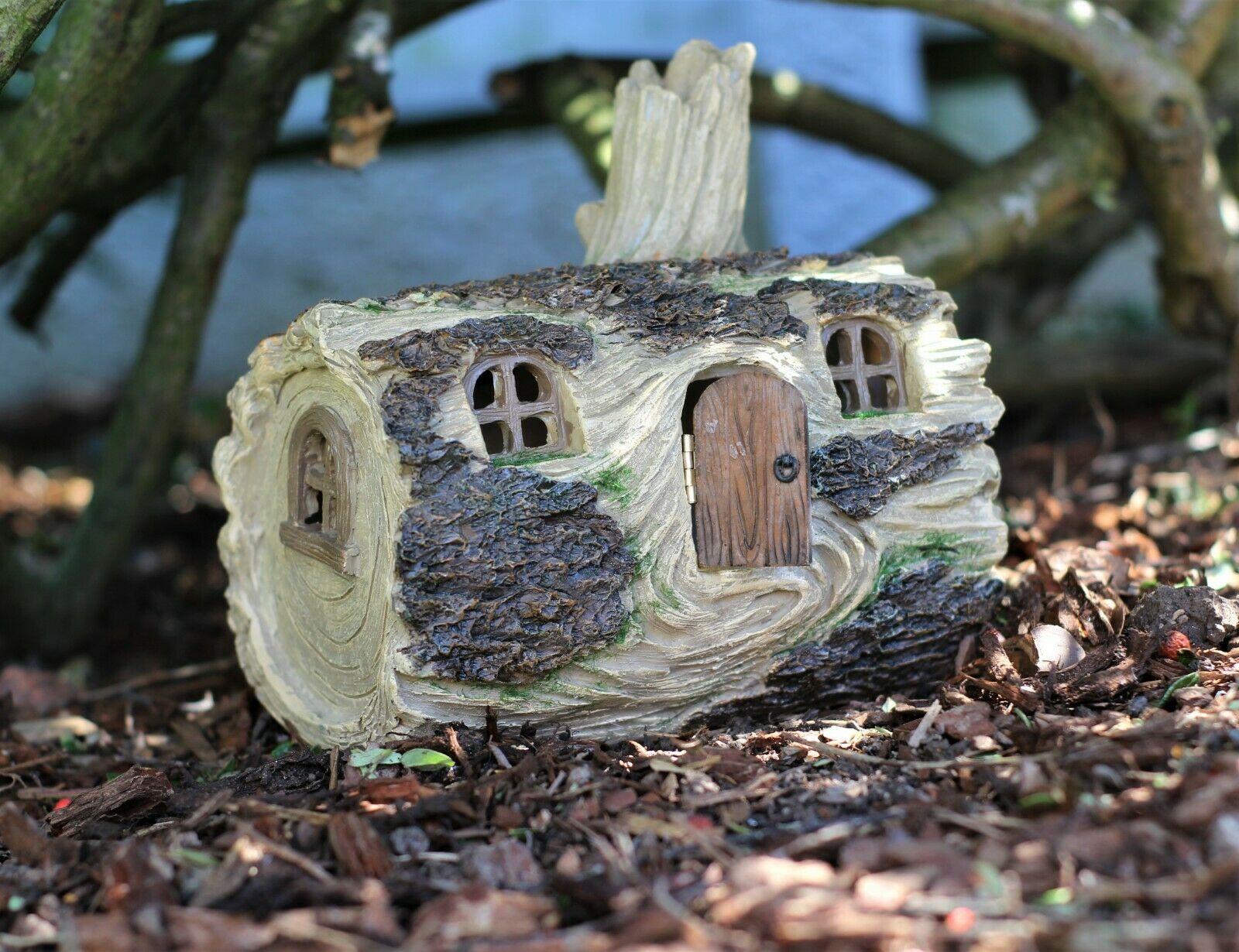 Solar powered Fairy Log House With Opening fairy Door