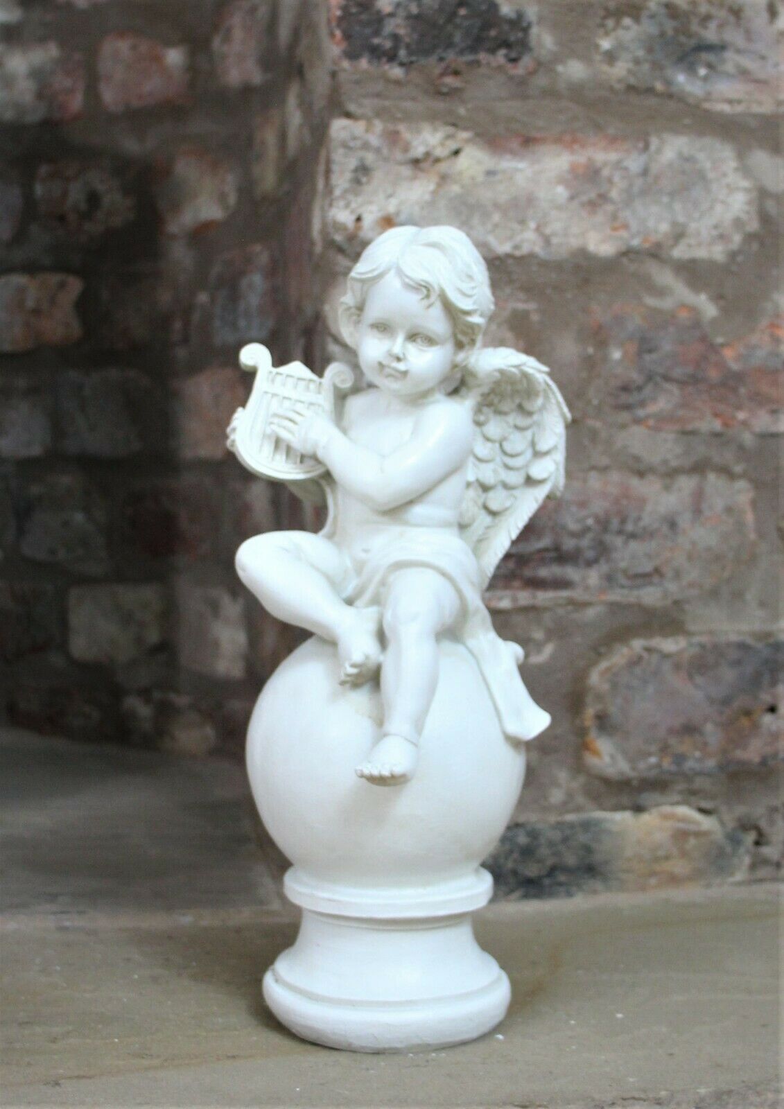 Boy and Girl Sitting Cherubs