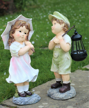 Little Girl with An Umbrella And Boy with Solar Light