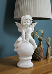 Boy and Girl Sitting Cherubs