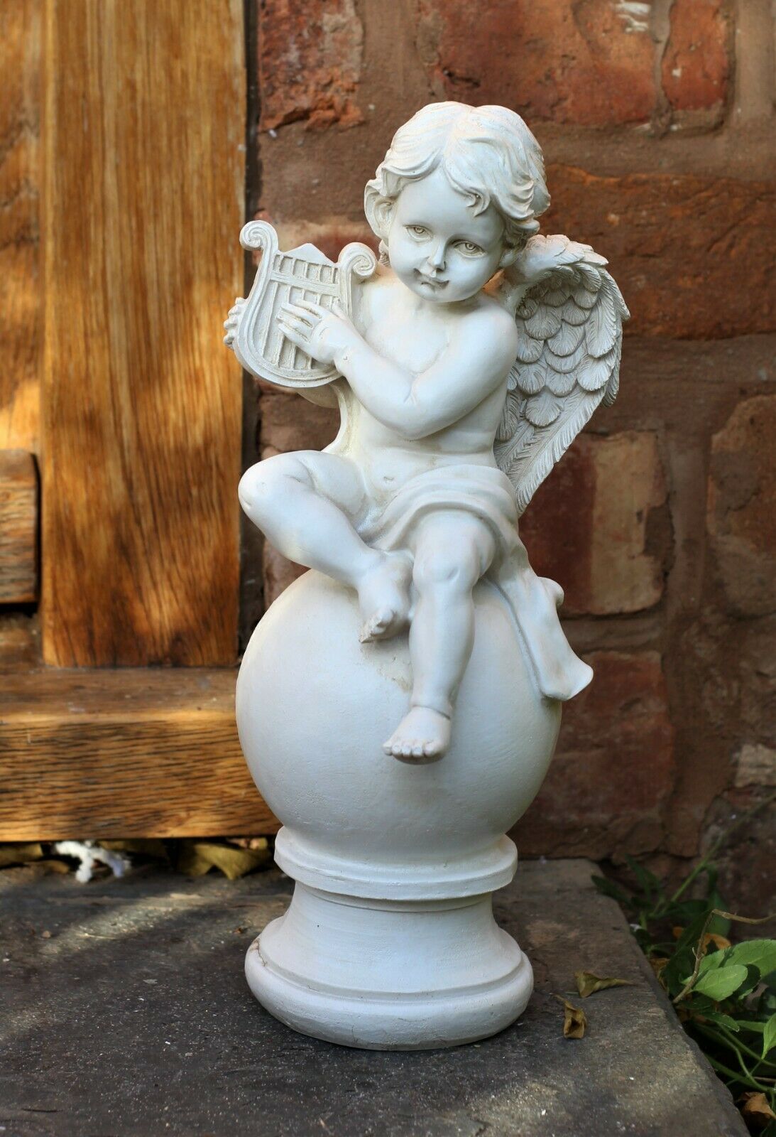 Boy and Girl Sitting Cherubs