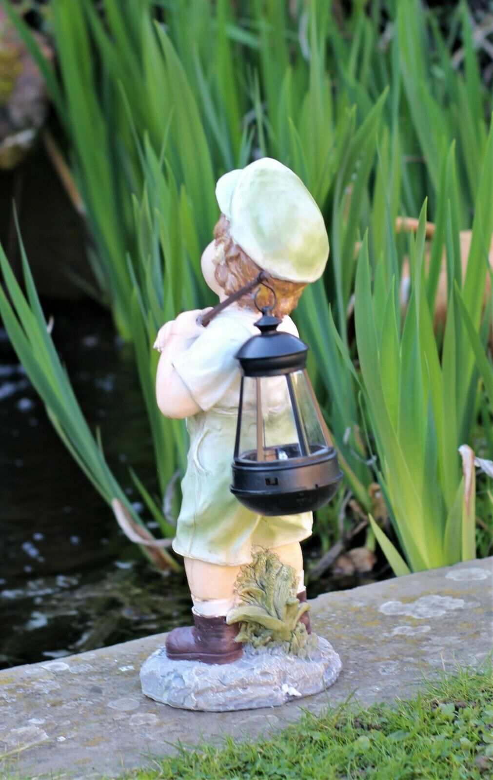 Little Girl with An Umbrella And Boy with Solar Light