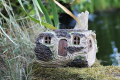 Solar powered Fairy Log House With Opening fairy Door