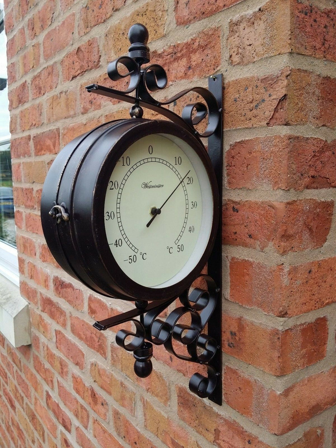 large garden clock with barometer