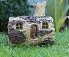 Solar powered Fairy Log House With Opening fairy Door