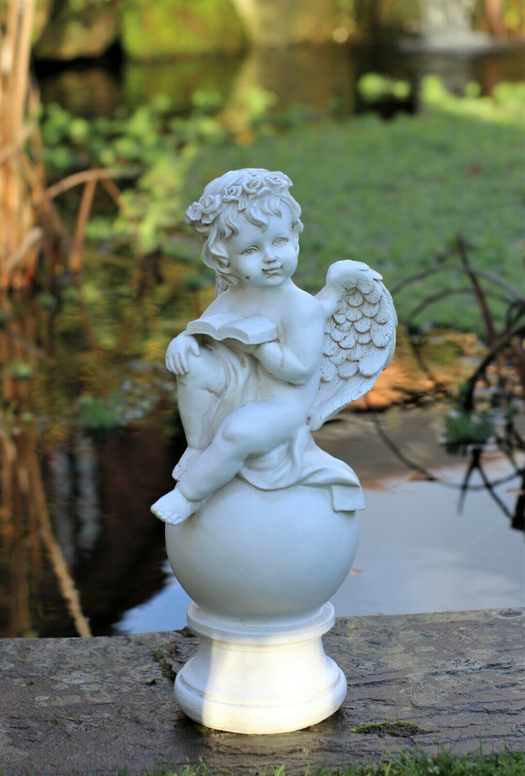 Boy and Girl Sitting Cherubs