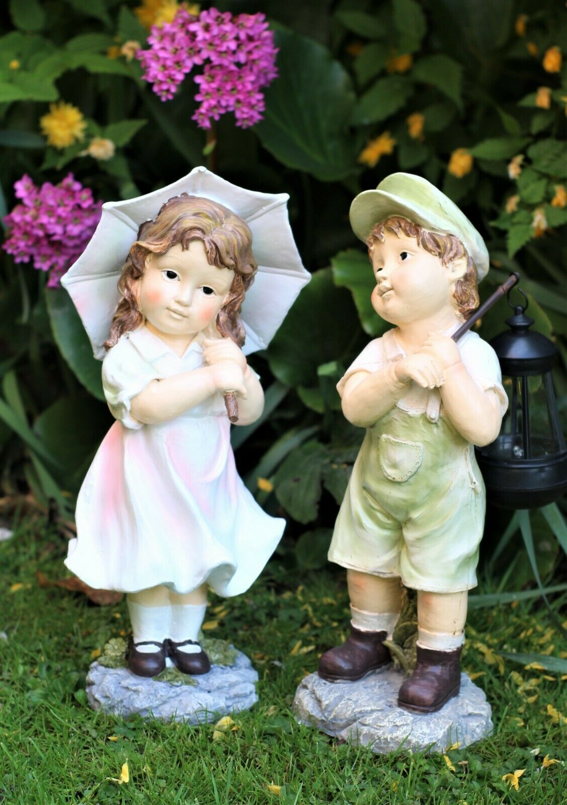 Little Girl with An Umbrella And Boy with Solar Light