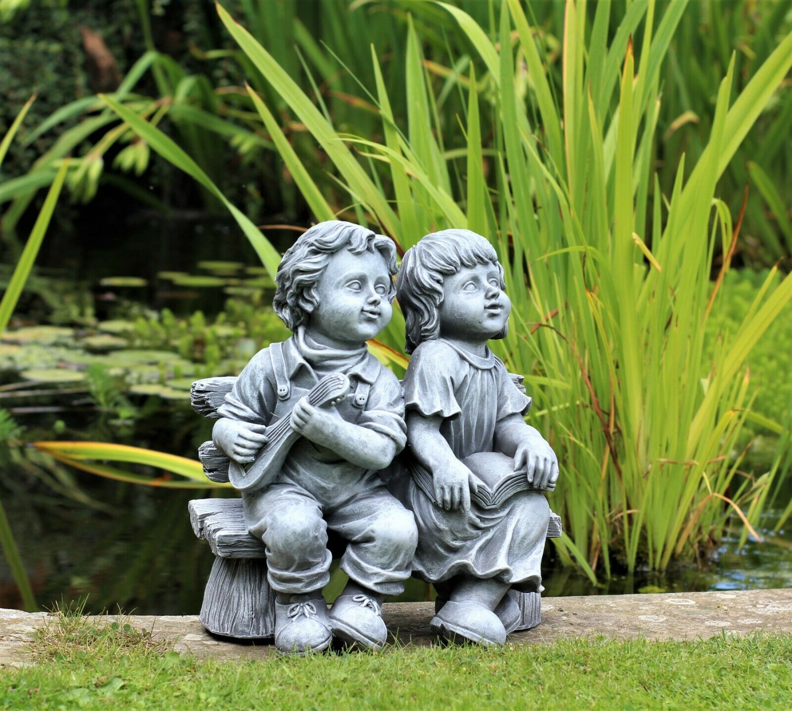 Grey Sitting Boy and Girl Garden Ornament