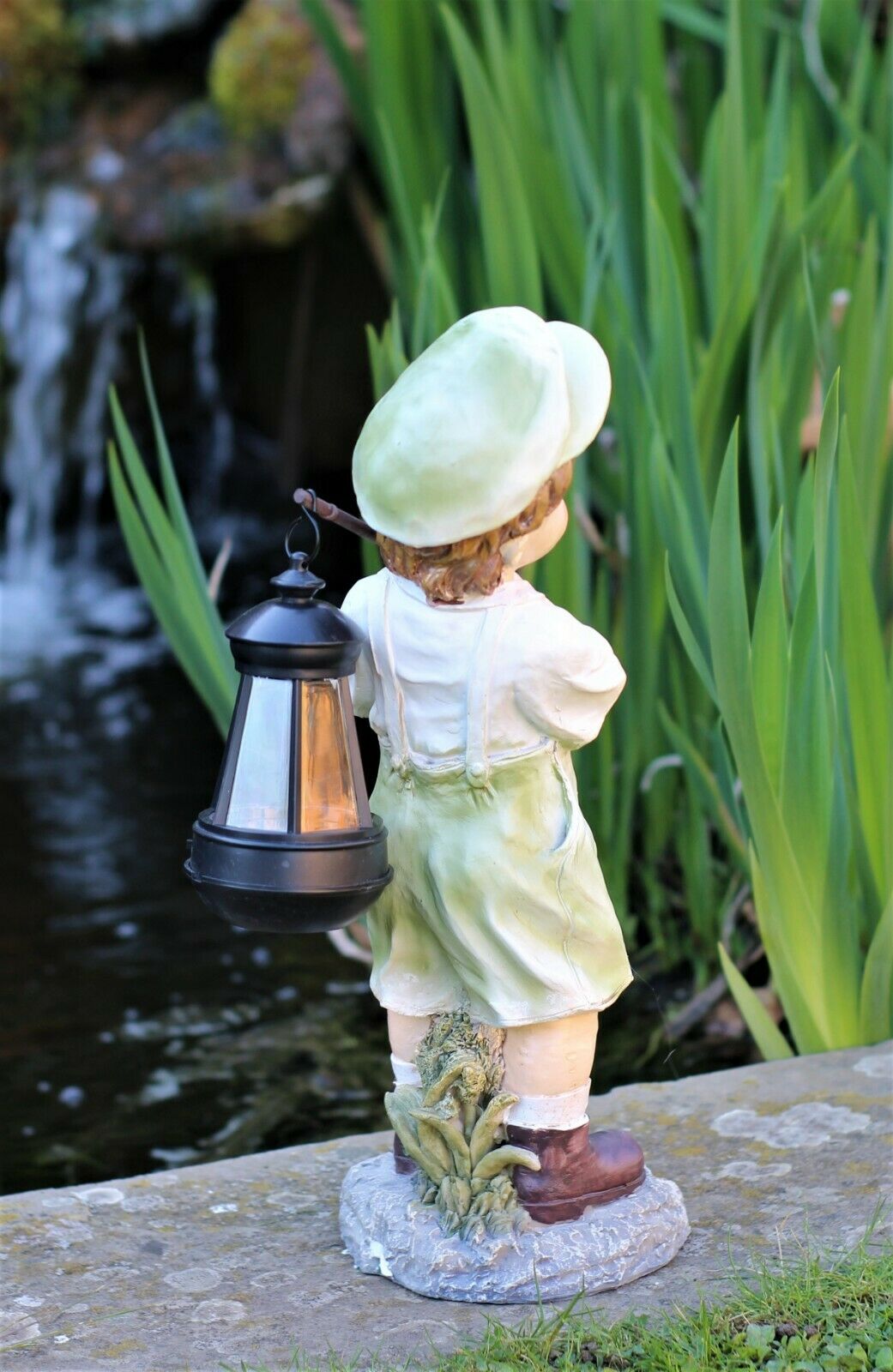 Little Girl with An Umbrella And Boy with Solar Light