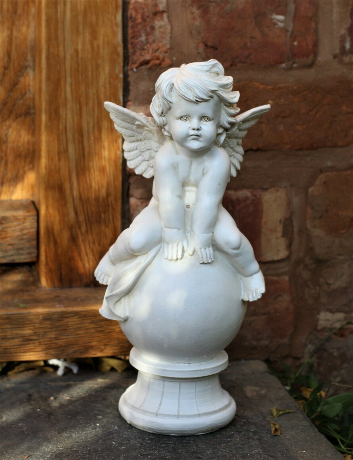 Boy and Girl Sitting Cherubs