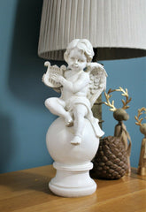 Boy and Girl Sitting Cherubs