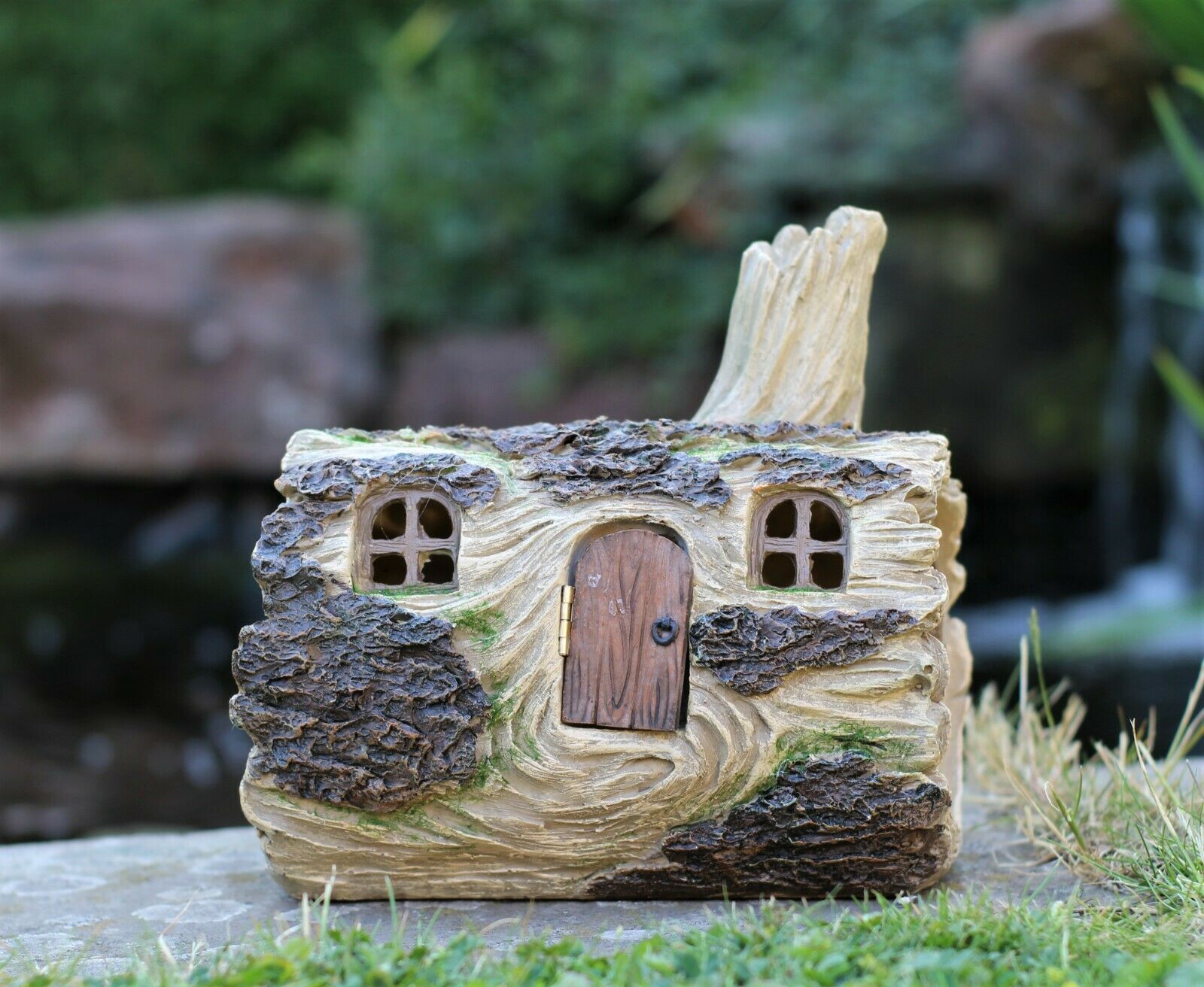 Solar powered Fairy Log House With Opening fairy Door